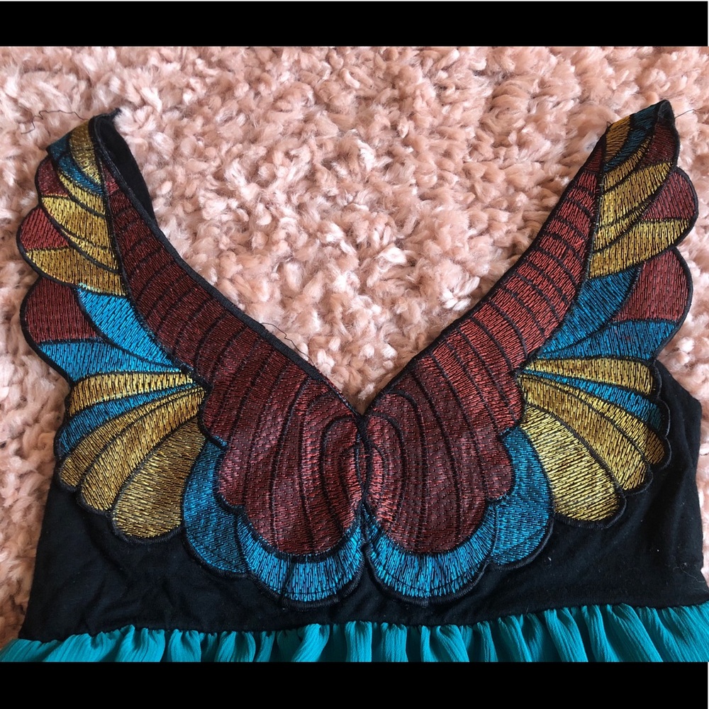 Winged Top! - Picture 3 of 3